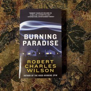 📖 Science fiction novel Burning Paradise by Robert Charles Wilson